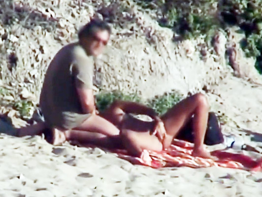 Imagen Porno Voyeur Video de una pareja practicando sexo oral en la playa